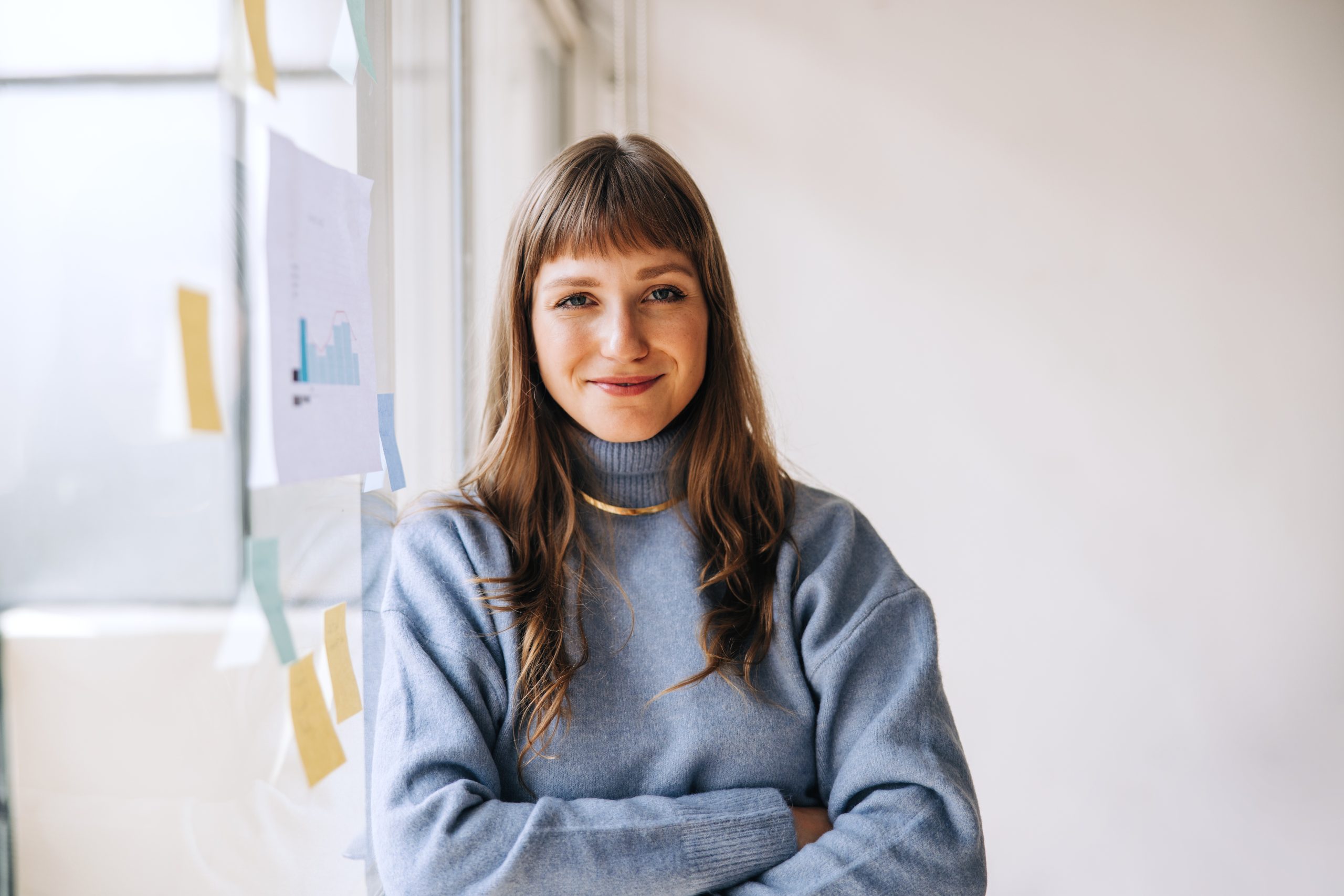 Portrait,Of,A,Young,Businesswoman,Looking,At,The,Camera,While