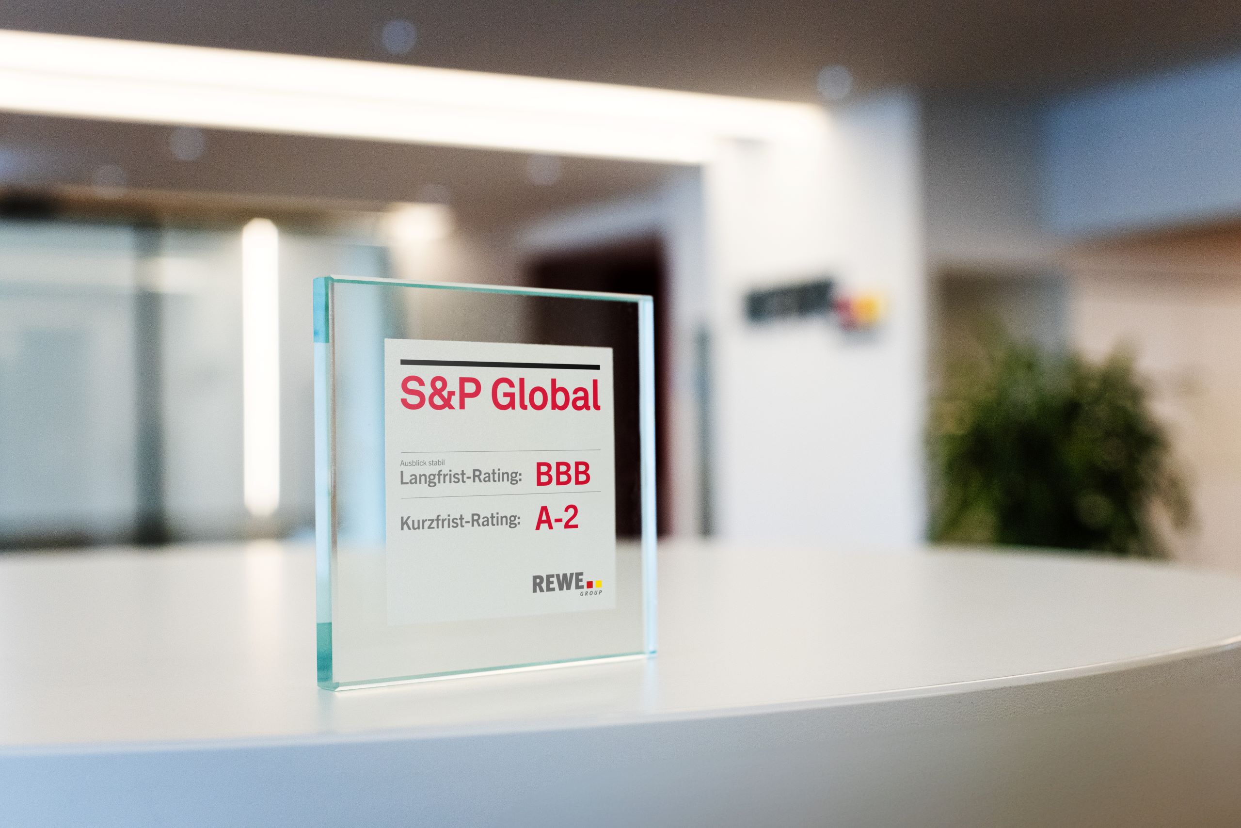 Glass display stand featuring the S&P rating: Long-term rating: BBB and Short-term rating: A-2