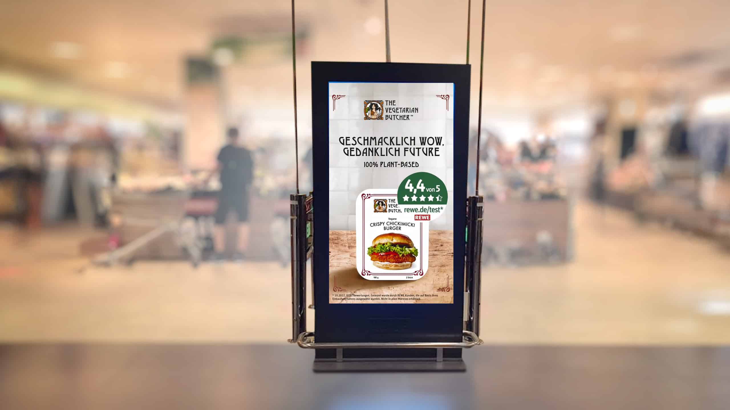 Werbestehle von REWE mit Plant Based Burger