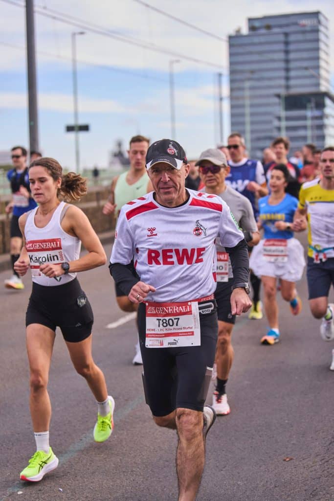 Jan Kunath, stellvertretender CEO der REWE Group, beim Köln Marathon als Läufer.