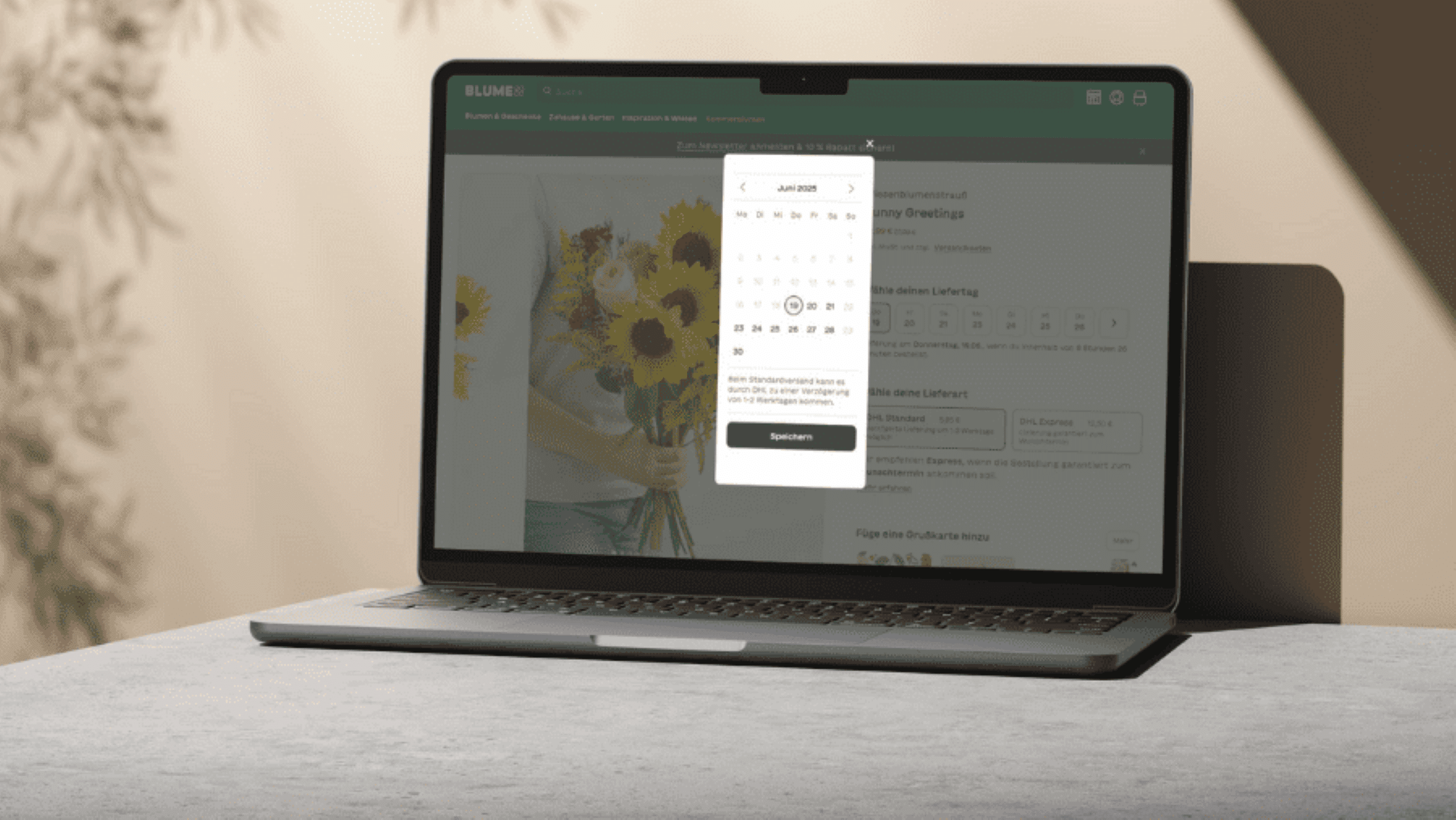 Aufgeklappter Laptop mit dem Blumen 2000 Shop.
