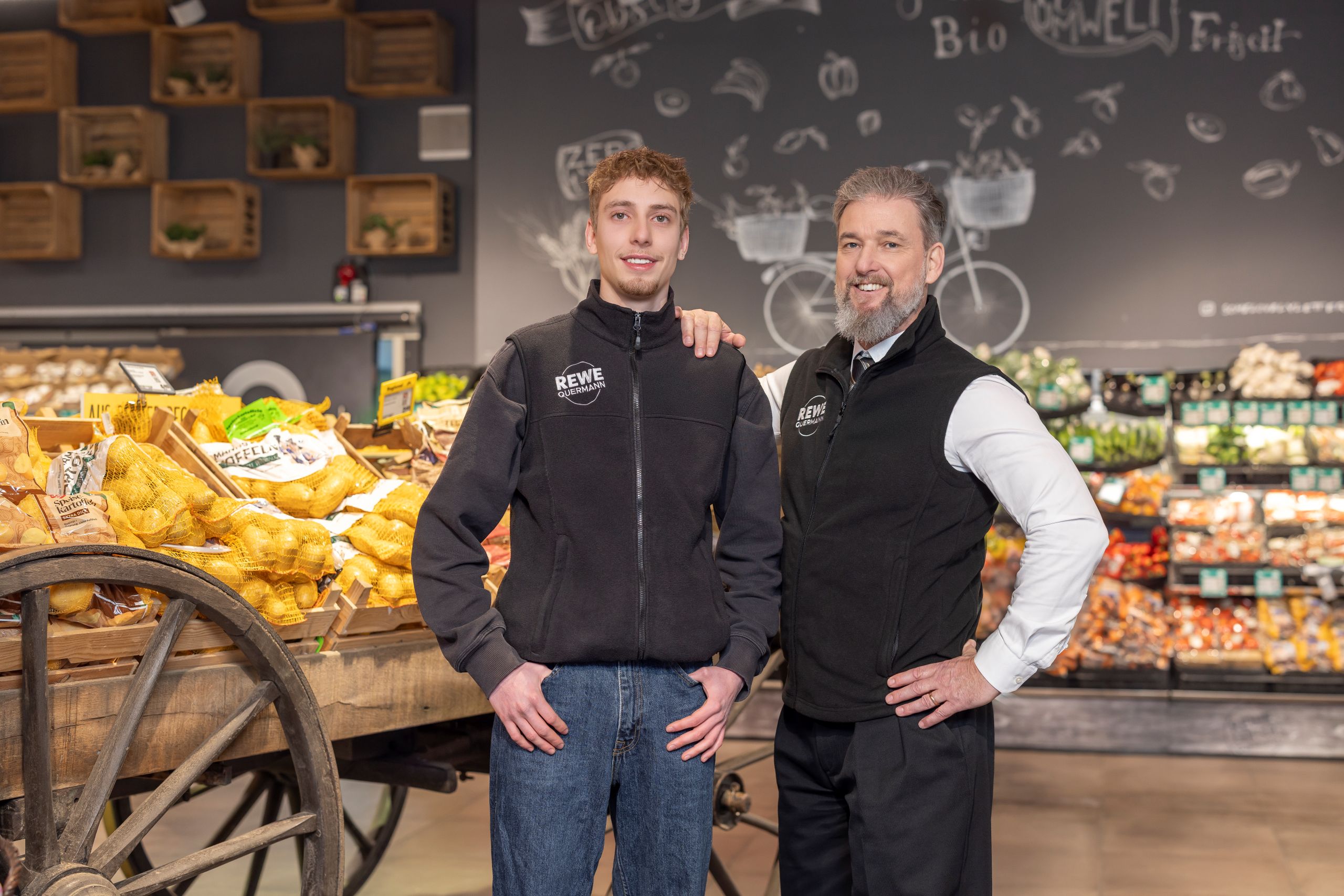 REWE Kaufmann Quermann mit Sohn