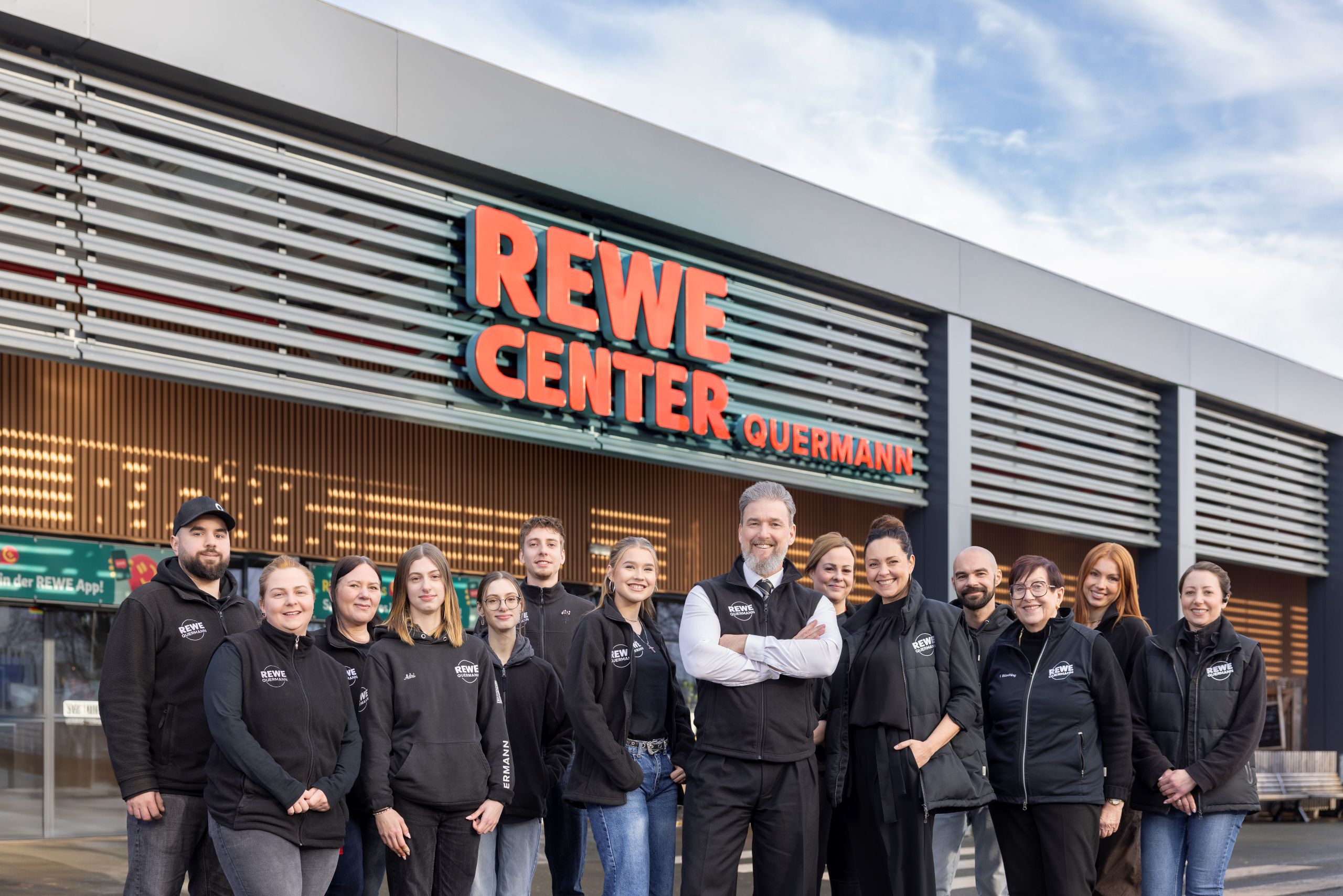 Familie Quermann mit Team
